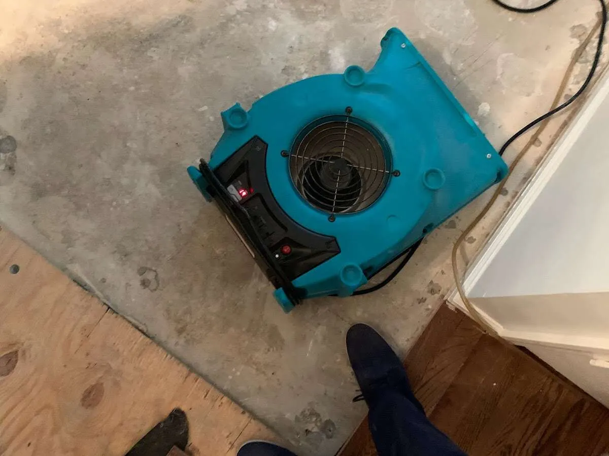 Air mover drying subfloor during Leak Detection & Repair in Moreno Valley